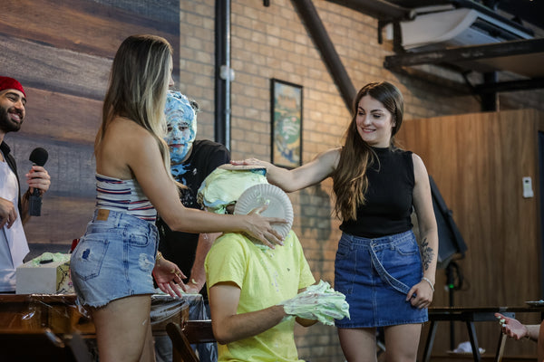 man gets pied of attractive womans